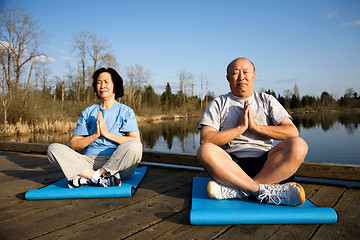 Image showing Senior couple meditating