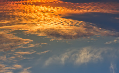 Image showing Skyscape with orange clouds