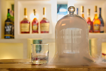 Image showing Guatemalan rum under a glass dome