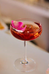 Image showing Pink Cocktail with fresh rose petals