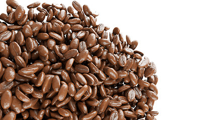 Image showing roasted coffee grains falling and mixing 