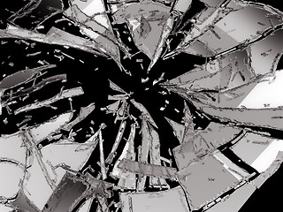 Image showing Broken and damaged glass isolated over black