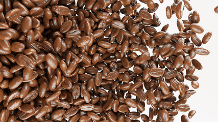 Image showing roasted coffee beans tossed and mixed isolated 