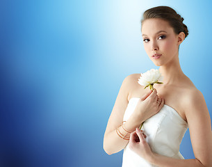 Image showing beautiful asian woman with flower and jewelry