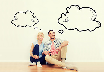 Image showing happy couple of man and woman moving to new home