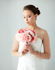 Image showing beautiful asian woman with flower and jewelry