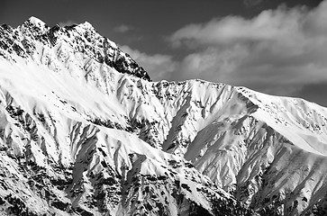 Image showing Black and white snowy sunlight mountains at nice day