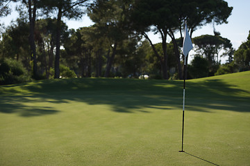 Image showing golfer hitting a sand bunker shot