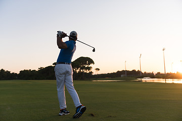 Image showing golfer hitting long shot