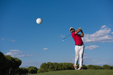 Image showing golf player hitting long shot