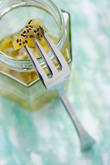 Image showing Kiwi fruit jam on fork