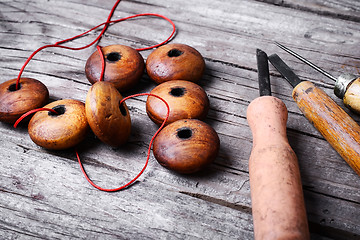 Image showing Handmade with wooden beads