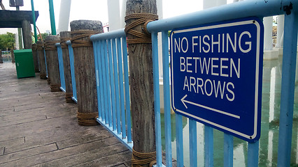 Image showing No fishing sign at dock