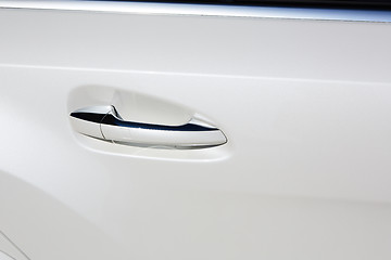 Image showing white car door handle