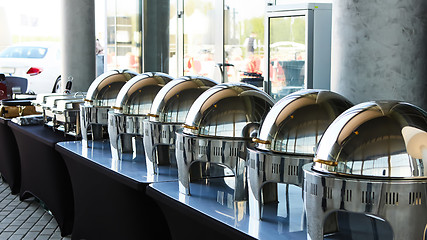 Image showing Buffet Table with Row of Food Service Steam Pans