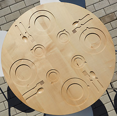 Image showing Empty Plate, Knife and Fork on wooden background.