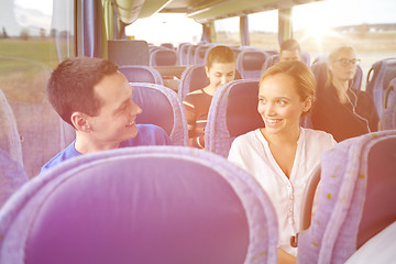 Image showing group of happy passengers in travel bus