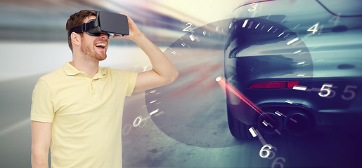 Image showing man in virtual reality headset and car racing game