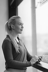 Image showing business woman using smart phone at office