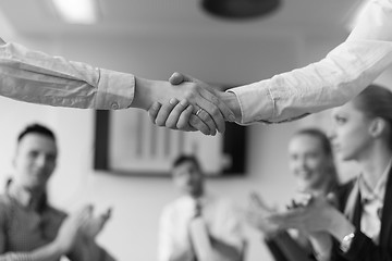 Image showing business womans handshake