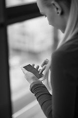 Image showing business woman using smart phone at office