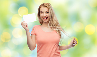 Image showing happy woman or teen girl with blank white paper