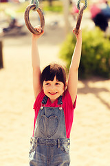 Image showing happy little girl on children playground