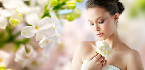 Image showing beautiful asian woman with flower and jewelry