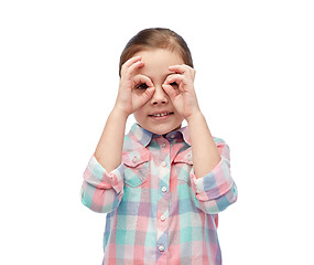 Image showing happy little girl making faces and having fun