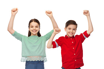 Image showing happy boy and girl celebrating victory