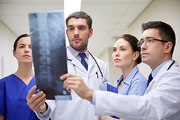 Image showing group of doctors looking at x-ray scan image