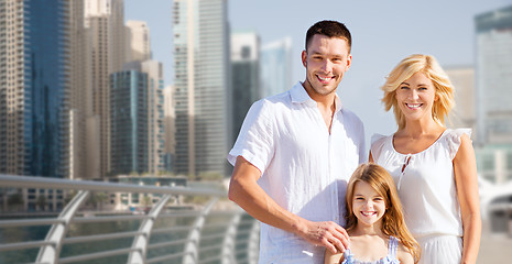 Image showing happy family over dubai city street background