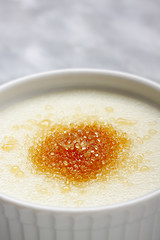 Image showing Ramekin filled by wheat semolina (farina) with milk and brown ca