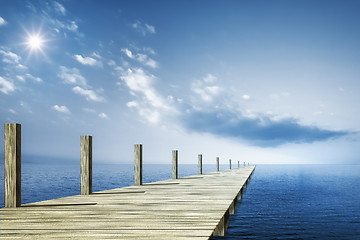 Image showing wooden jetty blue ocean