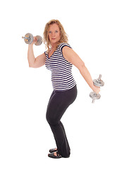 Image showing Woman workout with two dumbbells.