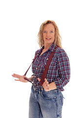 Image showing Woman in checkered shirt and suspender.