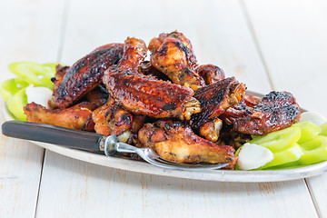 Image showing Chicken wings in honey glaze.