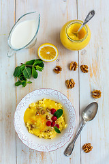 Image showing Millet porridge with lemon cream for a healthy diet.