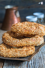 Image showing Bagels with sesame seeds on a tray closeup.