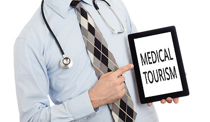 Image showing Doctor holding tablet - Medical tourism