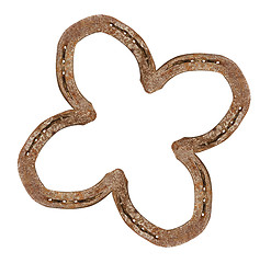 Image showing Horseshoes forming a clover leaf