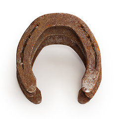 Image showing Stack of old rusty horseshoes