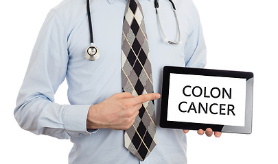 Image showing Doctor holding tablet - Colon cancer