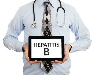 Image showing Doctor holding tablet - Hepatitis B