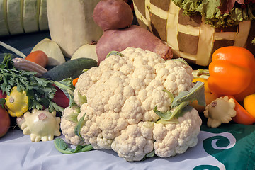 Image showing Vegetable harvest is sold at the fair.