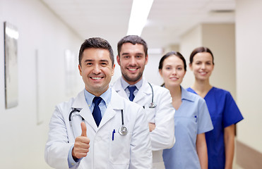 Image showing medics or doctors at hospital showing thumbs up