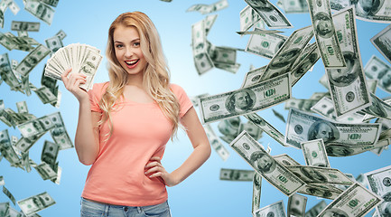 Image showing happy young woman with usa dollar cash money