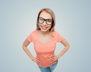 Image showing happy young woman or teenage girl in eyeglasses