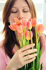 Image showing Mature woman with flowers