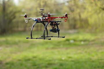 Image showing Drone flying in forest